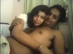 An elderly, lustful Indian amateur couple spooning in front of a livecam